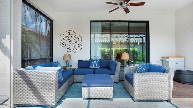 3668 Treasure Cove Ct, Naples, FL 34114 - living room featuring ceiling fan and a textured wall