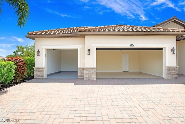 3668 Treasure Cove Ct, Naples, FL 34114 - garage with decorative driveway