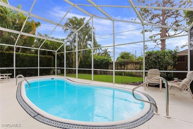 796 108th Ave N, Naples, FL 34108 - outdoor pool featuring a fenced backyard, a patio, and a lanai