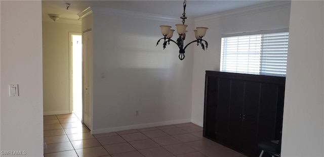 15539 Horseshoe Ln, Fort Myers, FL 33905 - empty room featuring crown molding, a chandelier, and light tile patterned floors