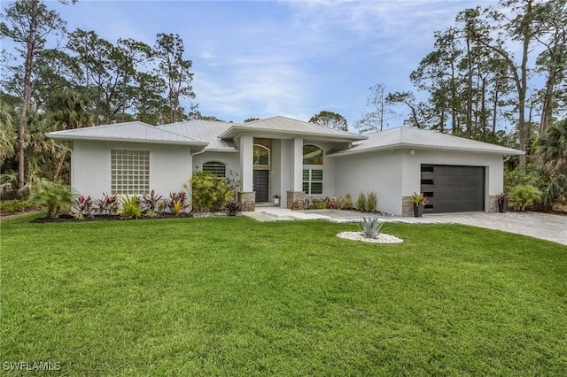364 Logan Blvd S, Naples, FL 34119 - prairie-style house with stucco siding, a garage, a front yard, and a metal roof