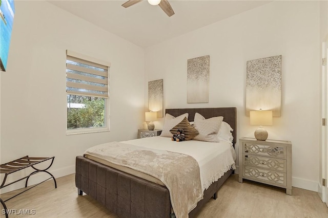 364 Logan Blvd S, Naples, FL 34119 - bedroom with light wood-style flooring and ceiling fan