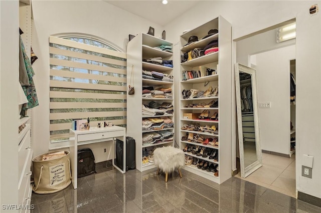 364 Logan Blvd S, Naples, FL 34119 - spacious closet featuring granite tiled floors