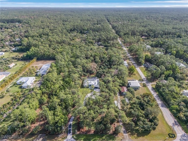 364 Logan Blvd S, Naples, FL 34119 - aerial overview of property's location featuring a heavily wooded area