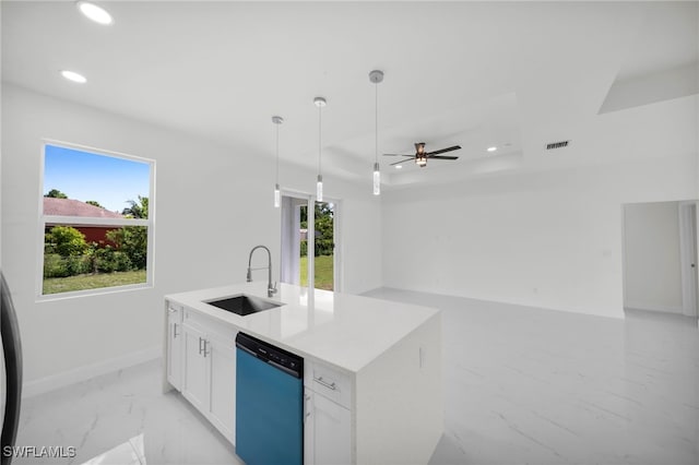 2605 28th St W, Lehigh Acres, FL 33971 - kitchen with dishwashing machine, light marble finish floors, recessed lighting, white cabinets, and open floor plan