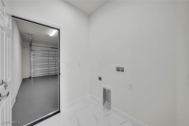 2605 28th St W, Lehigh Acres, FL 33971 - laundry room featuring hookup for a washing machine, electric dryer hookup, a garage, and marble finish floors