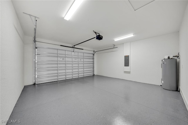 2605 28th St W, Lehigh Acres, FL 33971 - garage featuring water heater, electric panel, and a garage door opener
