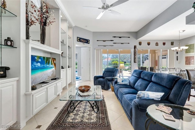 3008 Ellice Way, Naples, FL 34119 - living area with a ceiling fan, built in features, a chandelier, and light tile patterned flooring