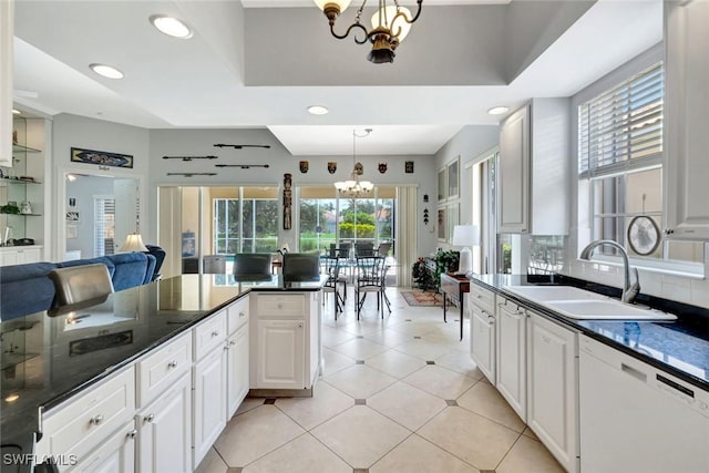 3008 Ellice Way, Naples, FL 34119 - kitchen with a chandelier, dishwasher, white cabinets, pendant lighting, and recessed lighting