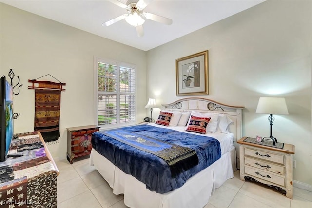 3008 Ellice Way, Naples, FL 34119 - bedroom featuring light tile patterned floors and ceiling fan