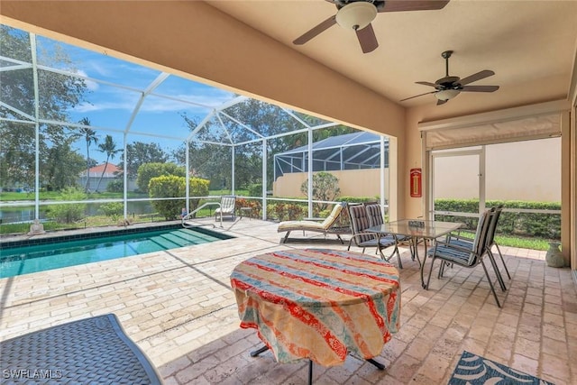 3008 Ellice Way, Naples, FL 34119 - view of patio with ceiling fan, an outdoor pool, and glass enclosure