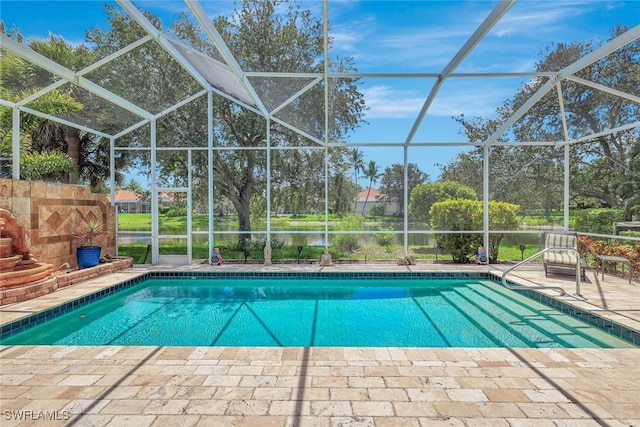 3008 Ellice Way, Naples, FL 34119 - outdoor pool featuring a patio area, a lanai, and a water view