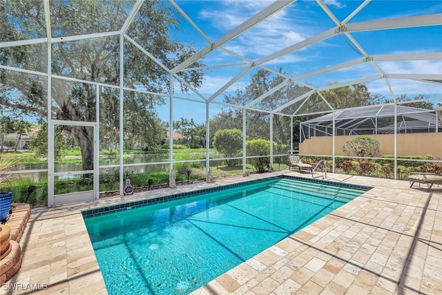 3008 Ellice Way, Naples, FL 34119 - outdoor pool with a patio, a water view, and a lanai