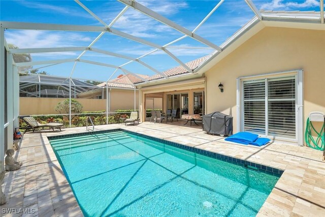 3008 Ellice Way, Naples, FL 34119 - view of pool with a patio area and a lanai