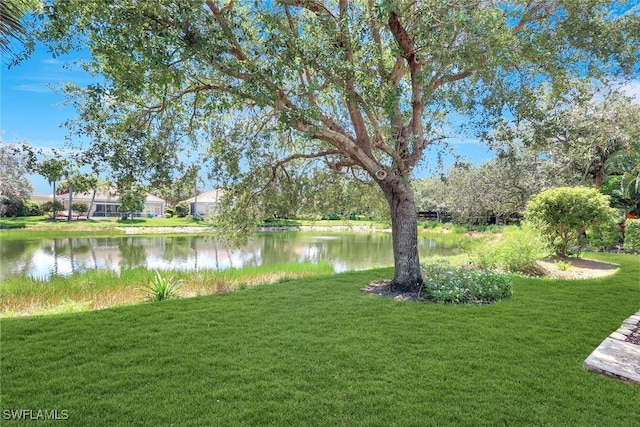 3008 Ellice Way, Naples, FL 34119 - view of green lawn featuring a water view