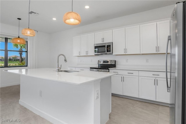20028 Napa Loop, Estero, FL 33928 - kitchen featuring appliances with stainless steel finishes, white cabinetry, light countertops, decorative light fixtures, and recessed lighting