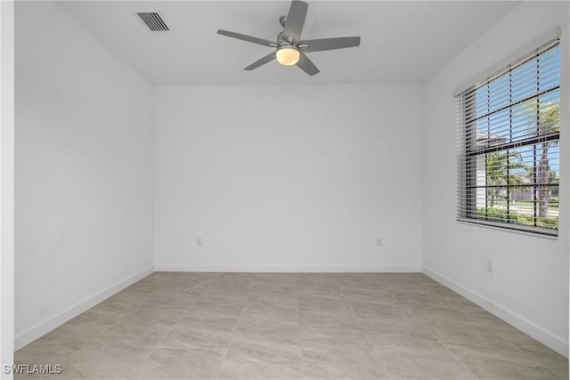 20028 Napa Loop, Estero, FL 33928 - unfurnished room with a ceiling fan and baseboards
