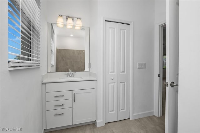 20028 Napa Loop, Estero, FL 33928 - bathroom featuring vanity and a closet