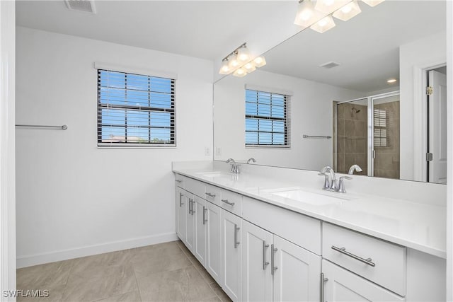 20028 Napa Loop, Estero, FL 33928 - full bathroom featuring double vanity and a shower stall