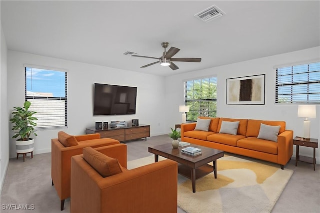 20028 Napa Loop, Estero, FL 33928 - living room with light colored carpet and a ceiling fan