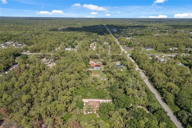 3210 2nd Ave SE, Naples, FL 34117 - aerial overview of property's location featuring a forest