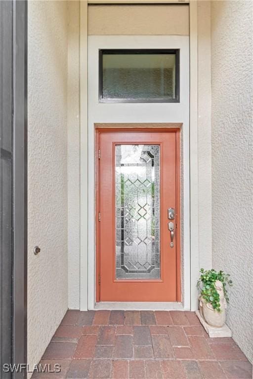 11288 Red Bluff Ln, Fort Myers, FL 33912 - entrance to property with stucco siding