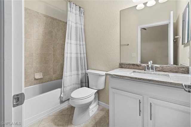 11288 Red Bluff Ln, Fort Myers, FL 33912 - full bath featuring a textured wall, vanity, shower / bath combo with shower curtain, and tile patterned flooring