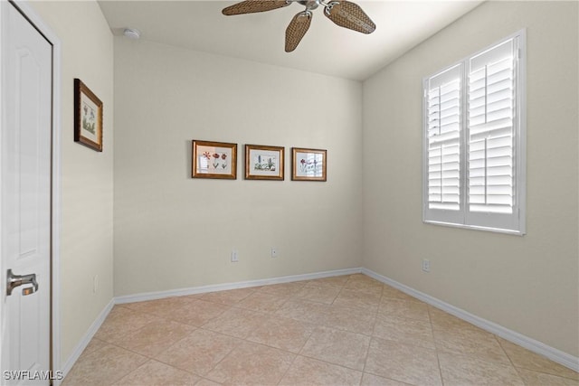 11288 Red Bluff Ln, Fort Myers, FL 33912 - empty room featuring ceiling fan, a smoke detector, plenty of natural light, and light tile patterned flooring