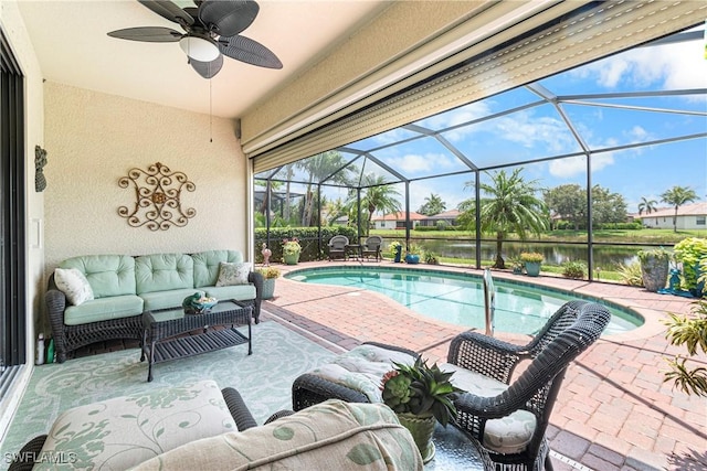 11288 Red Bluff Ln, Fort Myers, FL 33912 - outdoor pool featuring a water view, a patio area, outdoor lounge area, ceiling fan, and glass enclosure