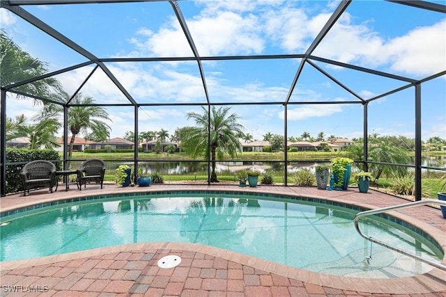 11288 Red Bluff Ln, Fort Myers, FL 33912 - swimming pool with a lanai, a water view, and a patio