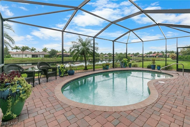 11288 Red Bluff Ln, Fort Myers, FL 33912 - outdoor pool with a patio, a water view, and a lanai