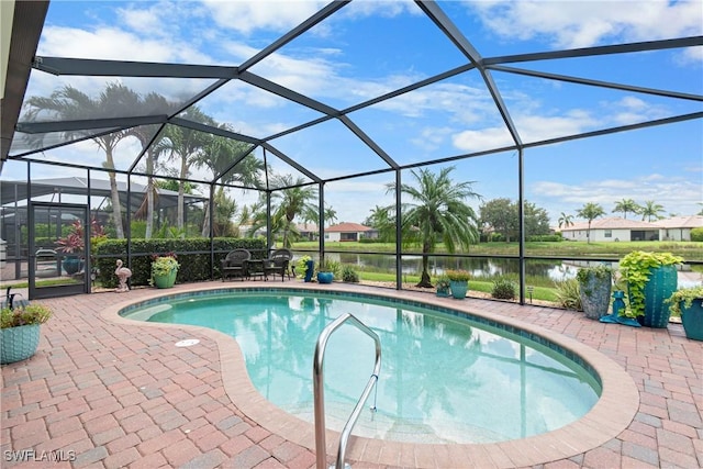 11288 Red Bluff Ln, Fort Myers, FL 33912 - outdoor pool with a patio, a water view, and glass enclosure