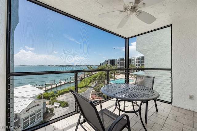 1085 Bald Eagle Dr Unit F409, Marco Island, FL 34145 - balcony featuring a water view and ceiling fan