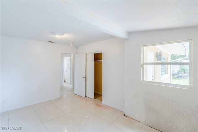 2414 Braman Ave, Fort Myers, FL 33901 - unfurnished bedroom with baseboards and a closet