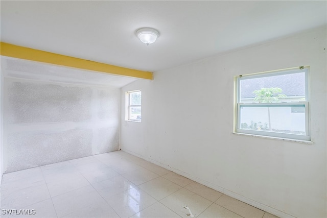 2414 Braman Ave, Fort Myers, FL 33901 - spare room featuring beamed ceiling