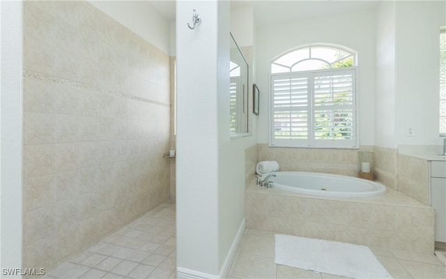 1221 SW 53rd Ter, Cape Coral, FL 33914 - bathroom with a jetted tub, tile patterned flooring, and walk in shower