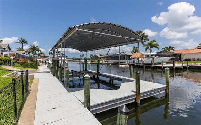 1221 SW 53rd Ter, Cape Coral, FL 33914 - dock with a water view and boat lift
