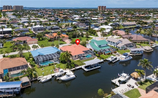 1221 SW 53rd Ter, Cape Coral, FL 33914 - aerial perspective of suburban area with a large body of water