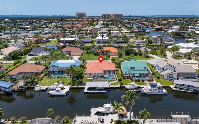 1221 SW 53rd Ter, Cape Coral, FL 33914 - aerial perspective of suburban area with a nearby body of water