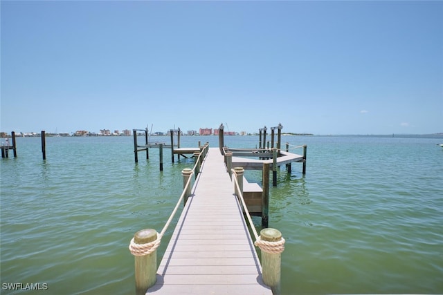 938 San Carlos Dr, Fort Myers Beach, FL 33931 - dock with a water view and boat lift