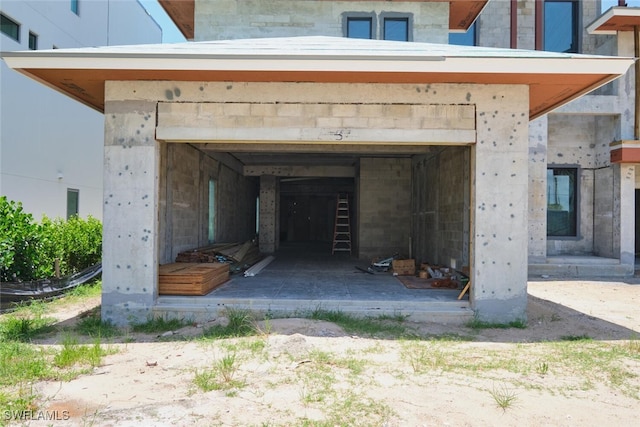 938 San Carlos Dr, Fort Myers Beach, FL 33931 - exterior view of concrete block siding