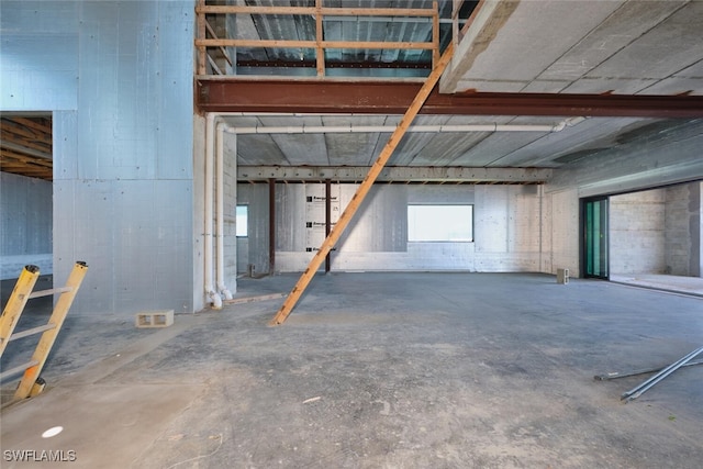 938 San Carlos Dr, Fort Myers Beach, FL 33931 - misc room with unfinished concrete floors