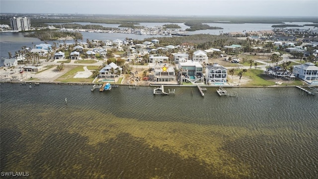 938 San Carlos Dr, Fort Myers Beach, FL 33931 - aerial view of residential area featuring a large body of water