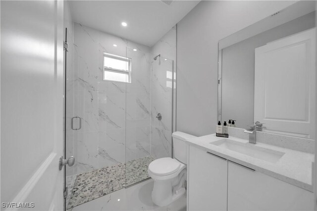 3103 Karen Ave S, Lehigh Acres, FL 33976 - bathroom with a marble finish shower, vanity, and recessed lighting