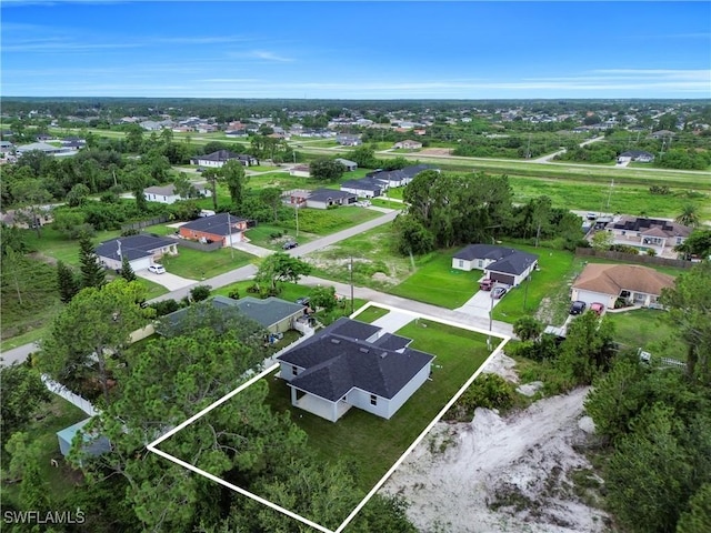 3103 Karen Ave S, Lehigh Acres, FL 33976 - aerial overview of property's location featuring nearby suburban area and property parcel outlined