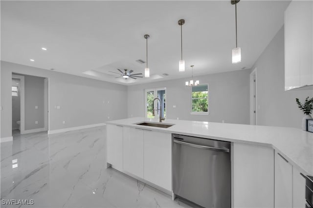 3103 Karen Ave S, Lehigh Acres, FL 33976 - kitchen featuring stainless steel dishwasher, white cabinetry, ceiling fan, light countertops, and modern cabinets