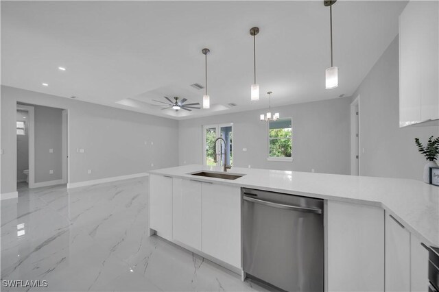 3103 Karen Ave S, Lehigh Acres, FL 33976 - kitchen featuring stainless steel dishwasher, white cabinetry, ceiling fan, light countertops, and modern cabinets