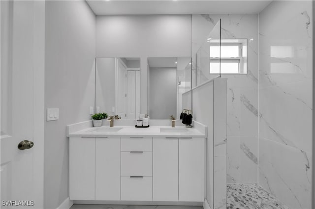 3103 Karen Ave S, Lehigh Acres, FL 33976 - bathroom featuring a marble finish shower and double vanity