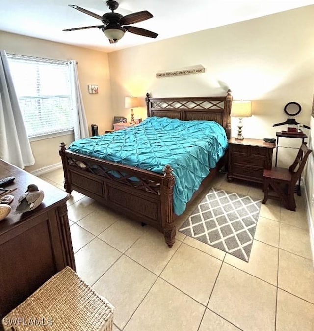 20608 Long Pond Rd, North Fort Myers, FL 33917 - bedroom with light tile patterned floors and ceiling fan
