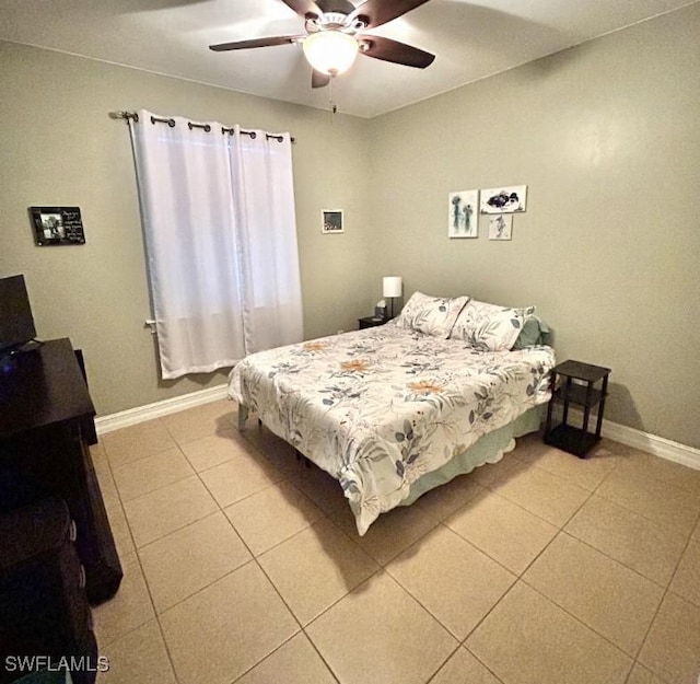 20608 Long Pond Rd, North Fort Myers, FL 33917 - bedroom with light tile patterned floors and a ceiling fan